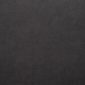 Dark gray textured surface, resembling leather, with a matte finish and fine grain; subtle tonal variations create a mottled, uniform appearance.